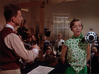 http://www.scene-stealers.com/wp-content/uploads/2011/09/010-Singin-in-the-Rain-1952-Kathy-Sings-Linas-Part.jpg