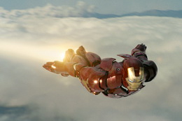 iron man flies through the sky